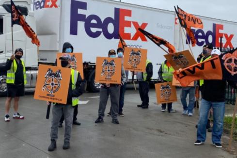 FedEx workers plan walk-off over pay